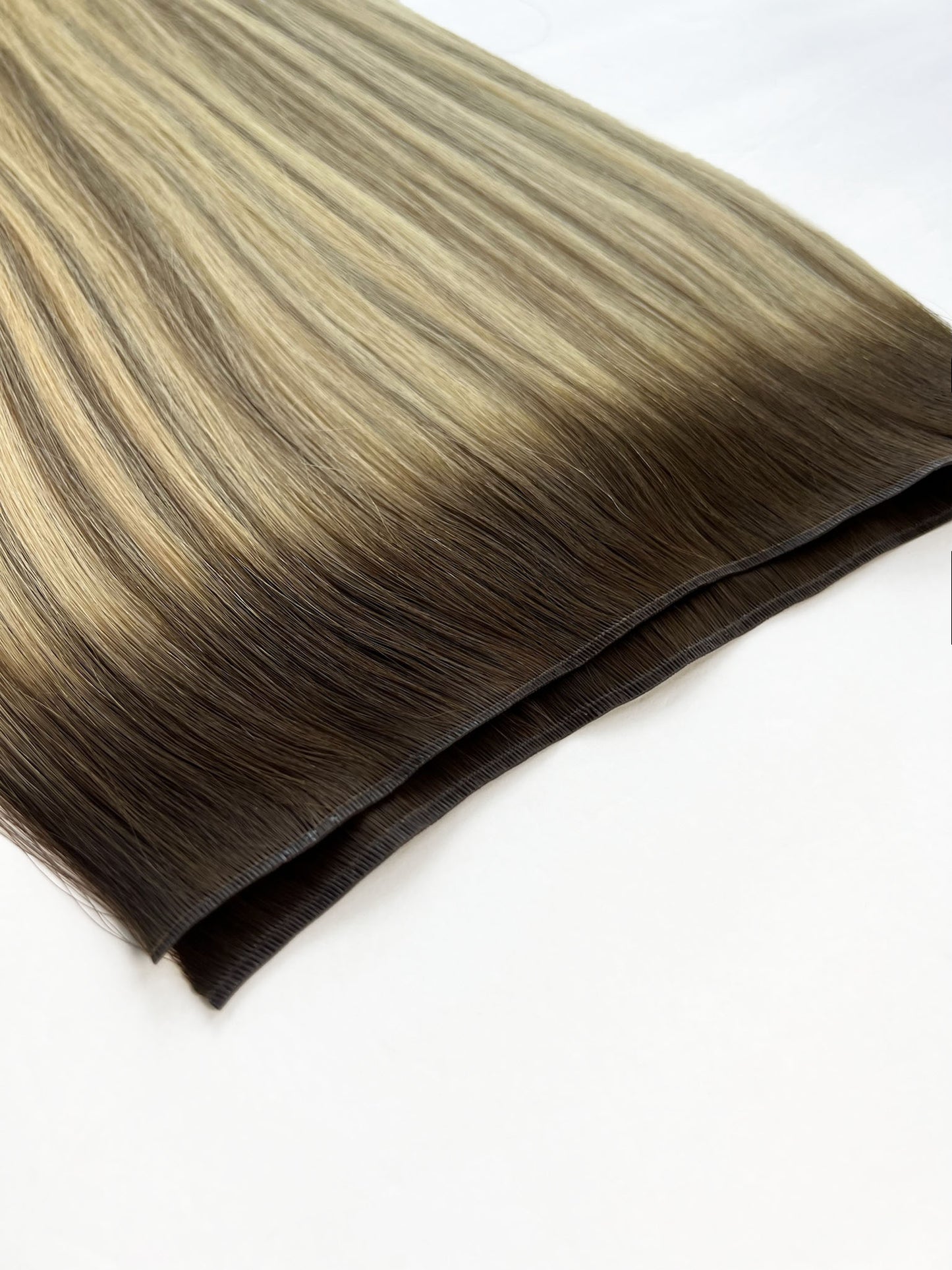 Genius weft with x3 the volume of a traditional weft. Made for comfort, from 100% cuticle aligned remy hair. 
