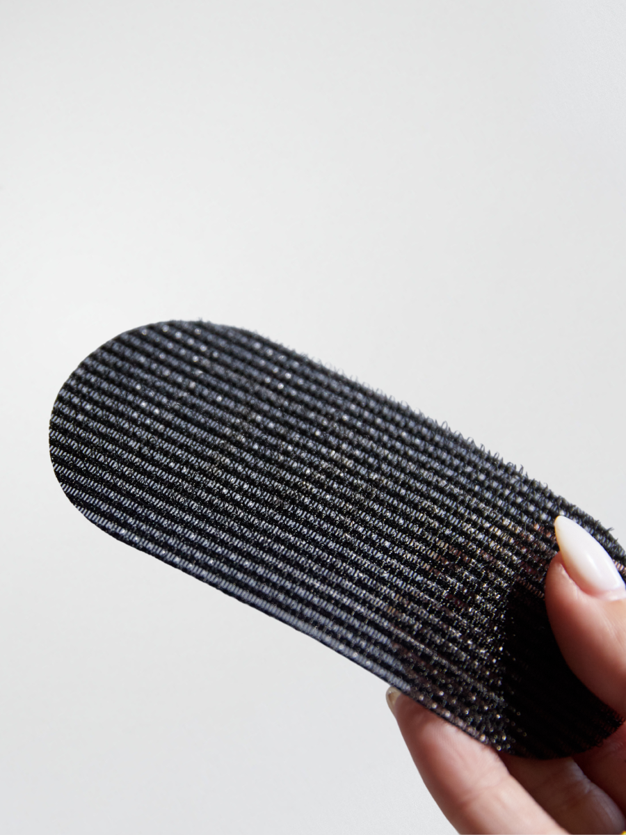 KOVI oval hair grippers, a must-have tool for professional hair extension stylists. These grippers provide a firm yet gentle hold, making sectioning and installation easier and more precise.